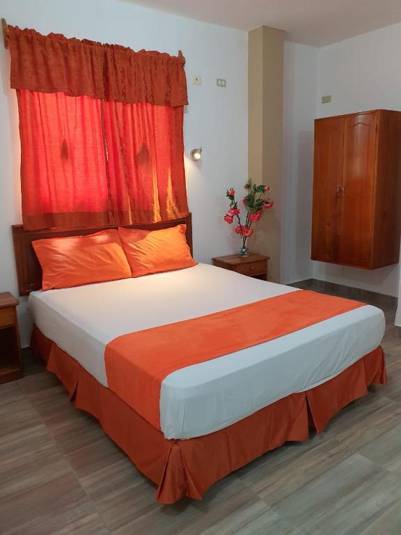 Postel nebo postele na pokoji v ubytování Hostal España