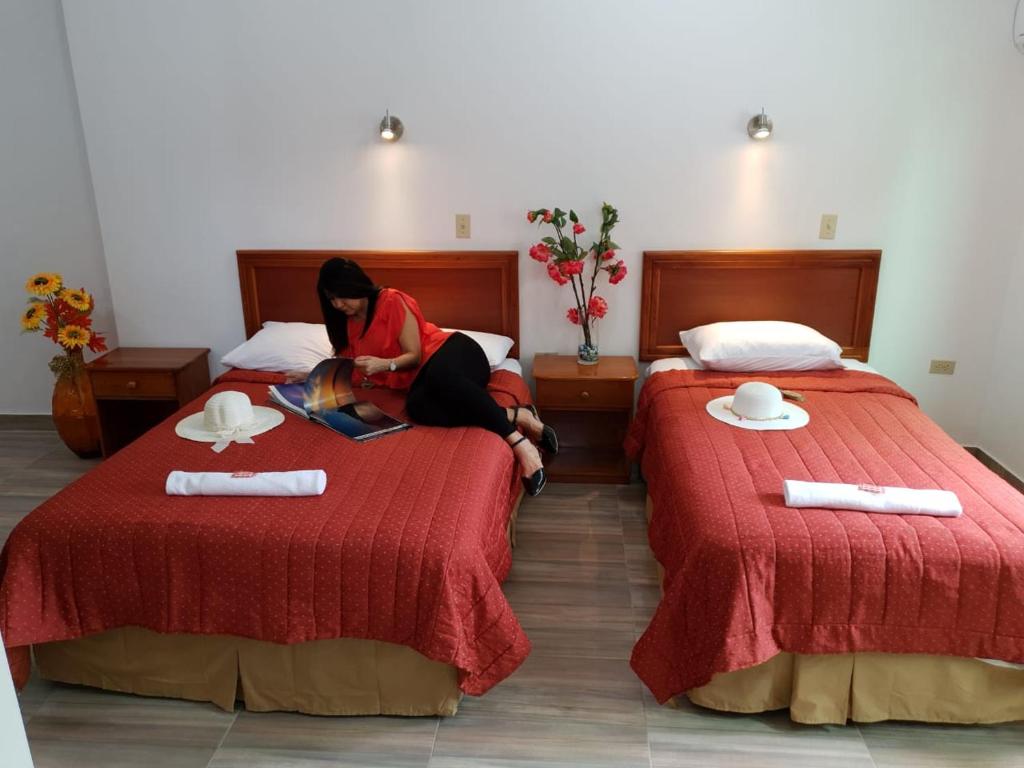 Postel nebo postele na pokoji v ubytování Hostal España