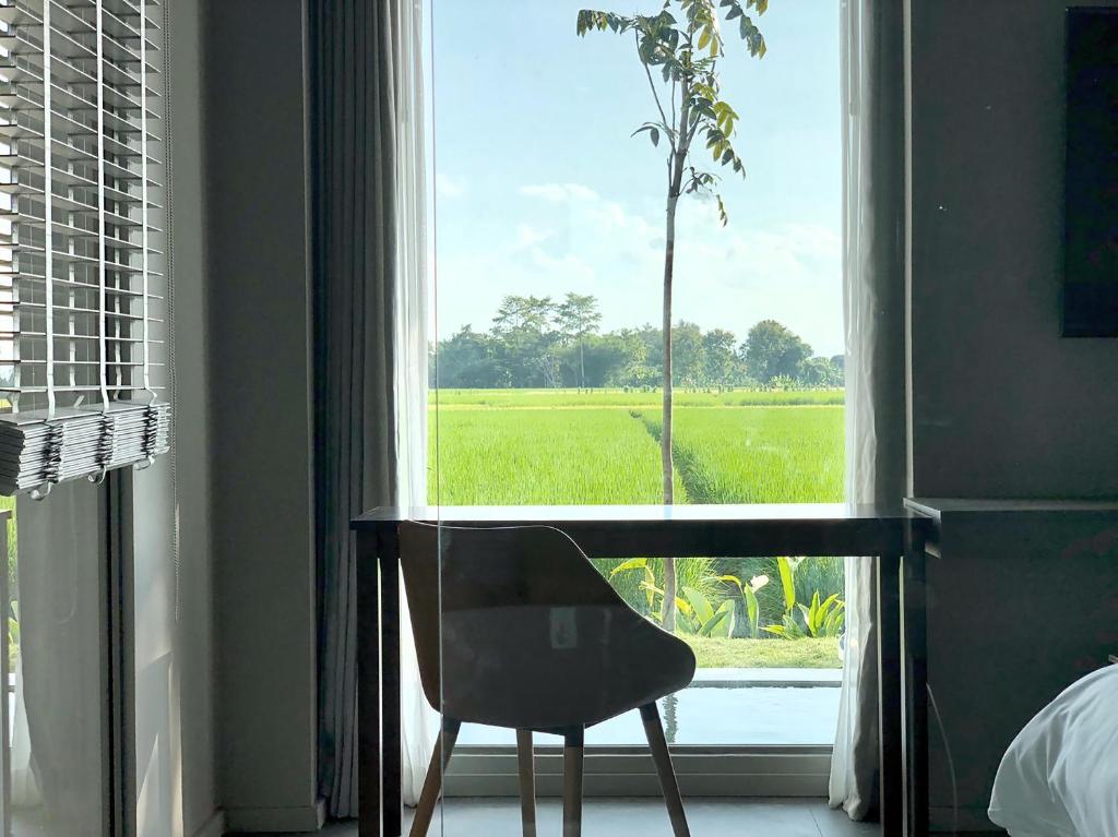 Postel nebo postele na pokoji v ubytování Doowall Hotel