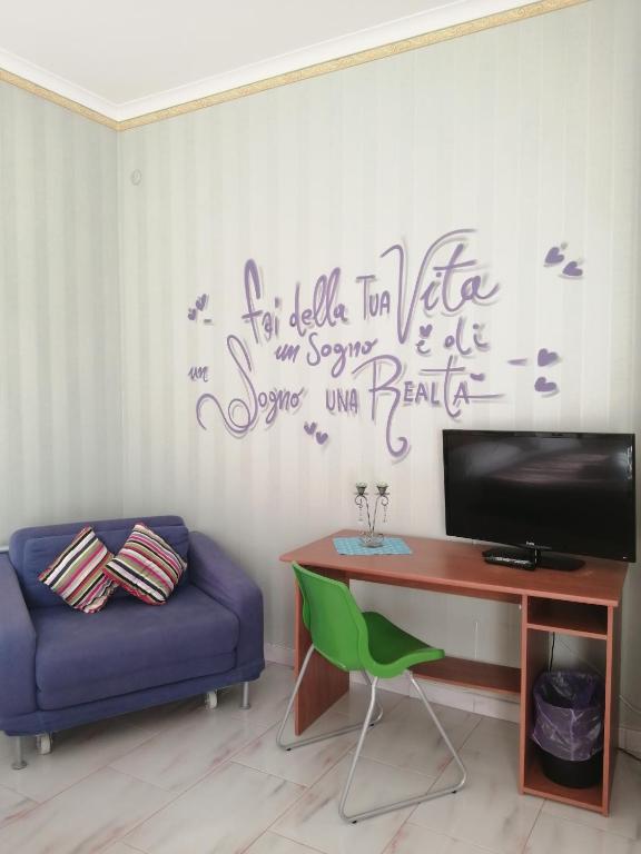 TV a/nebo společenská místnost v ubytování B&B A Casa Dei Nonni