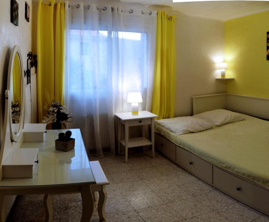 Postel nebo postele na pokoji v ubytování Mas Montebello