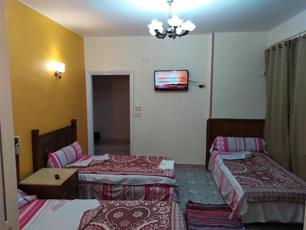 Postel nebo postele na pokoji v ubytování Cairo Moon Hostel