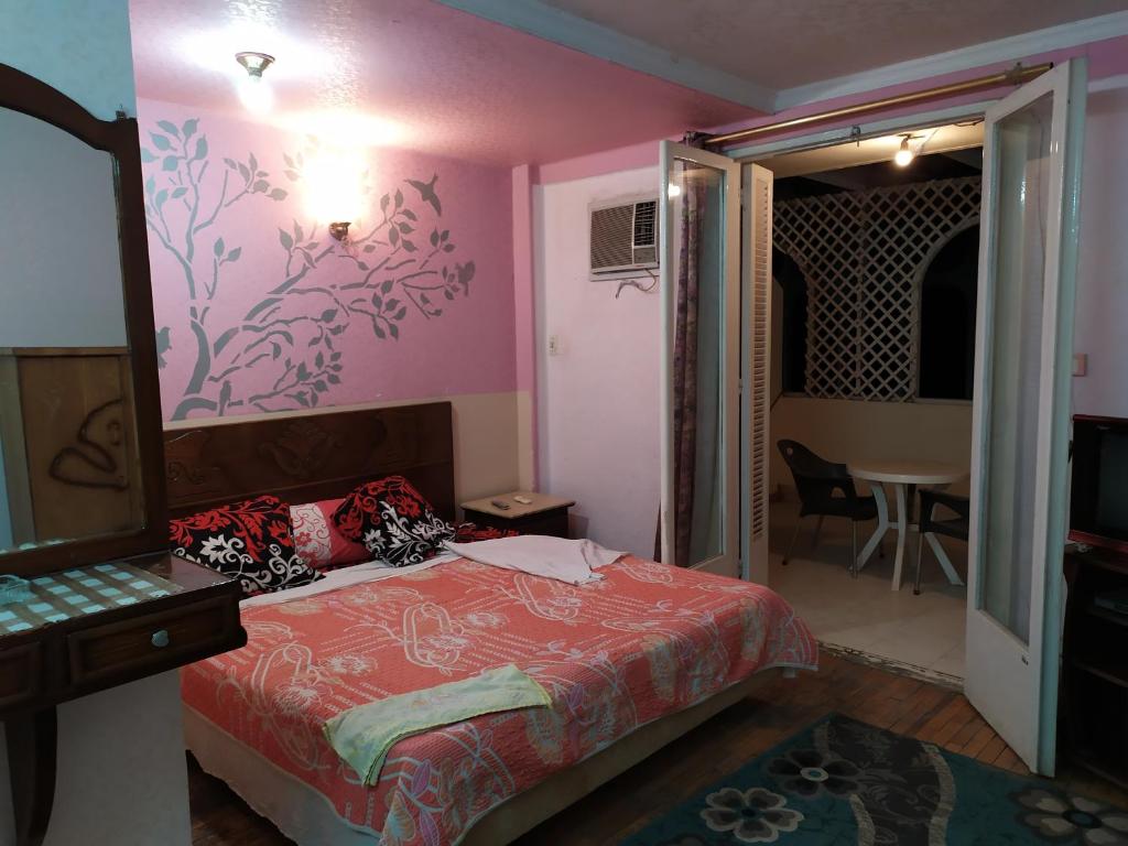 Postel nebo postele na pokoji v ubytování Cairo Moon Hostel