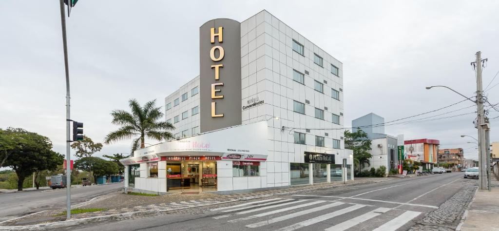 a building with a sign on the side of a street at Eunapolis Plaza Hotel in Eunápolis