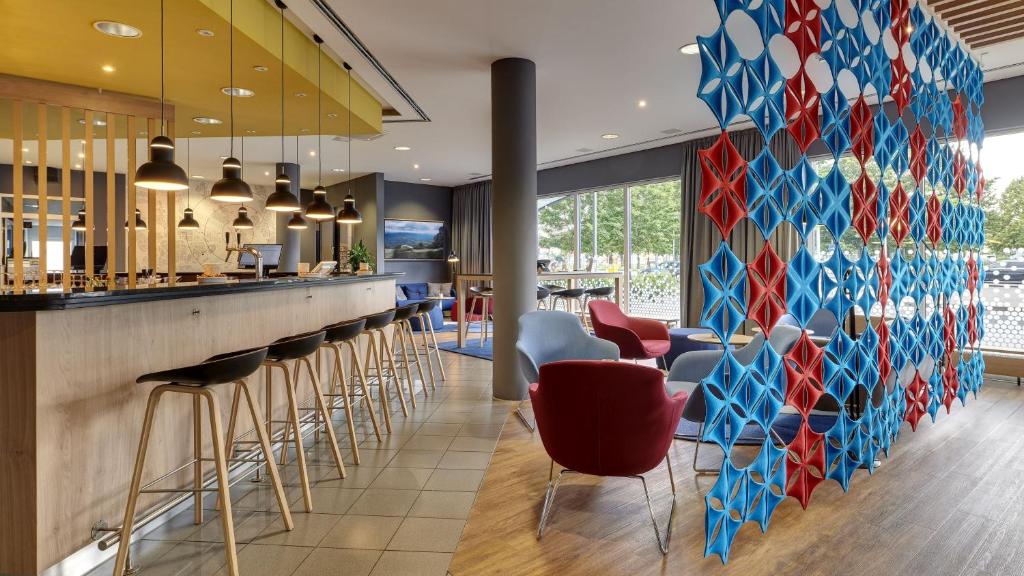 Restaurace v ubytování Holiday Inn Express Cologne Muelheim by IHG