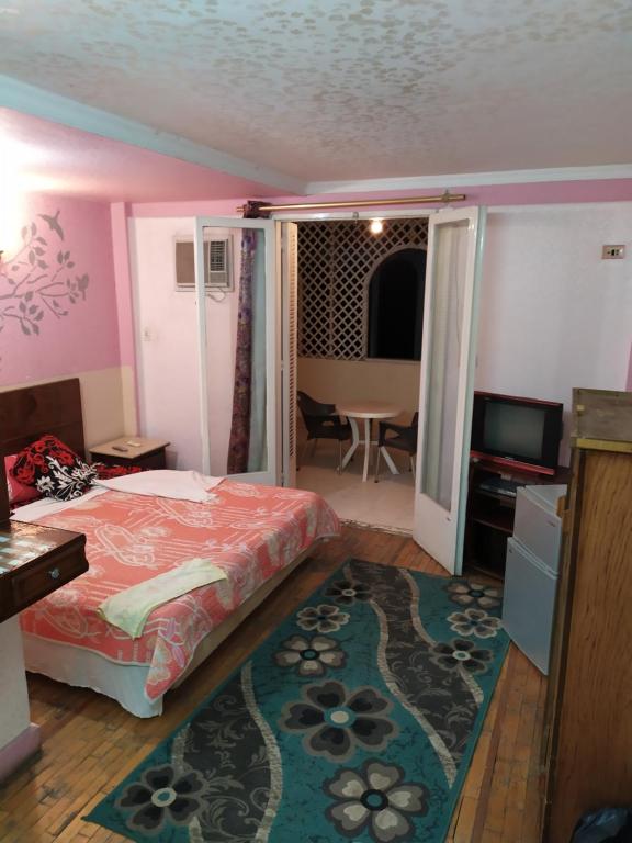 Postel nebo postele na pokoji v ubytování Cairo Moon Hostel