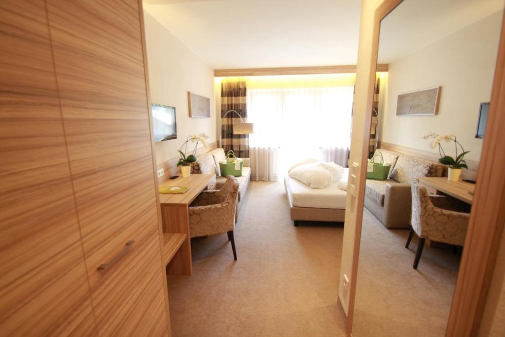 Postel nebo postele na pokoji v ubytování Genusshotel Diamant