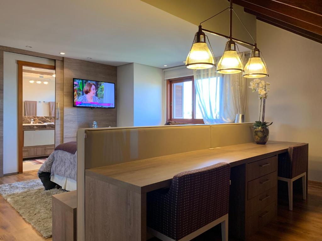 Vale das Hortênsias - Apto Gramado 300 metros Rua Coberta  Vale das Hortênsias - Apto Gramado 300 metros Rua Coberta