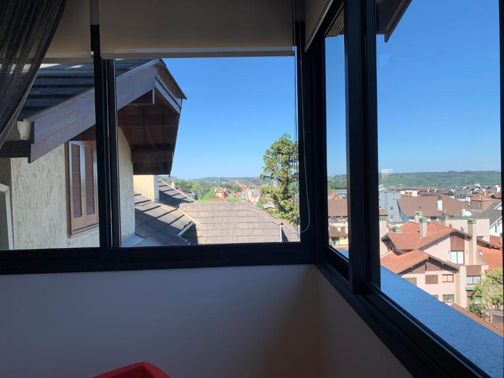 Vale das Hortênsias - Apto Gramado 300 metros Rua Coberta  Vale das Hortênsias - Apto Gramado 300 metros Rua Coberta