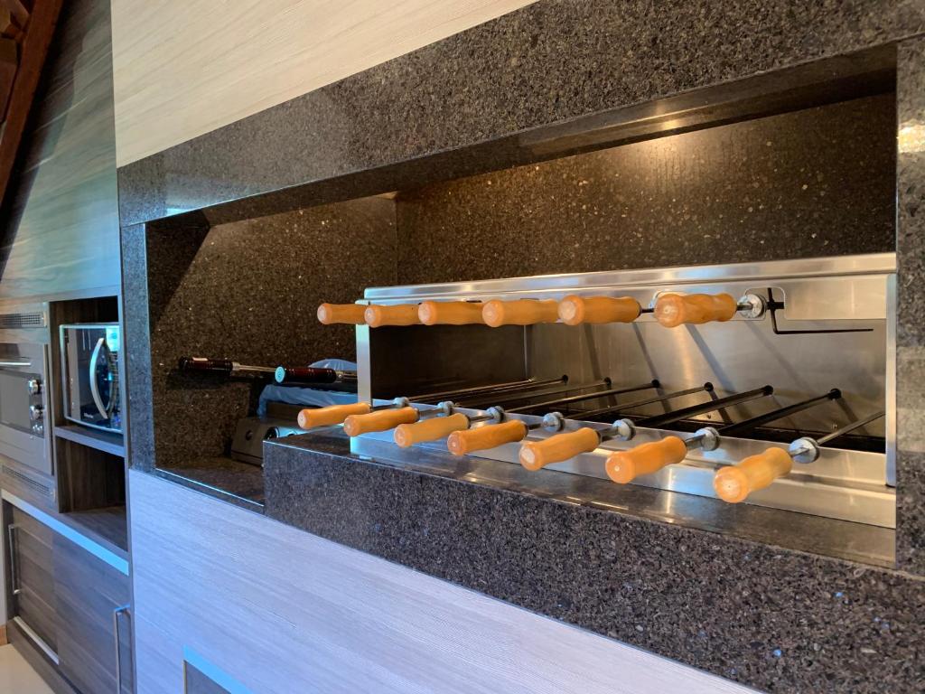 Vale das Hortênsias - Apto Gramado 300 metros Rua Coberta  Vale das Hortênsias - Apto Gramado 300 metros Rua Coberta