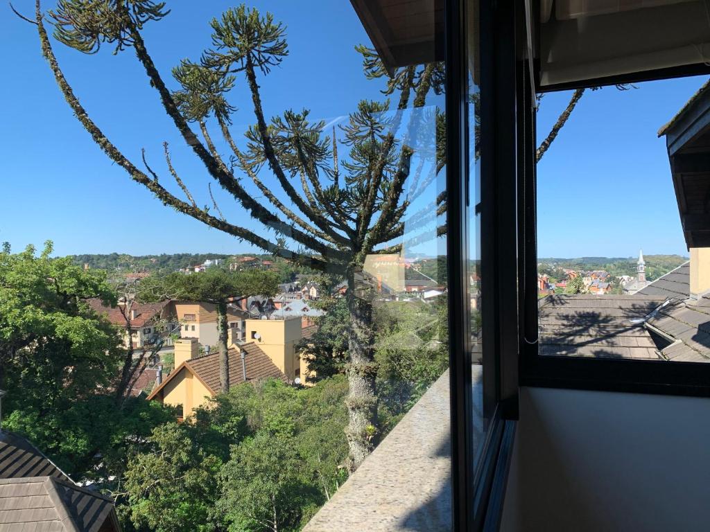 Vale das Hortênsias - Apto Gramado 300 metros Rua Coberta  Vale das Hortênsias - Apto Gramado 300 metros Rua Coberta