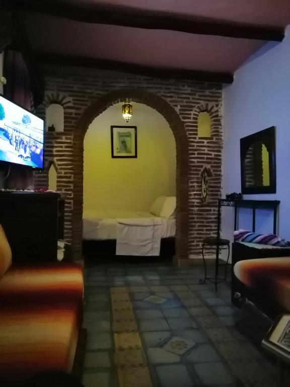 Een TV en/of entertainmentcenter bij Dar naya
