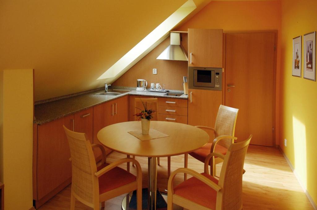 Kuchyň nebo kuchyňský kout v ubytování Hotel Restaurant Modrá Hvězda