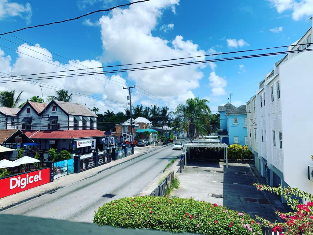 a view of a street in a small town at Beach Vue Barbados in Bridgetown