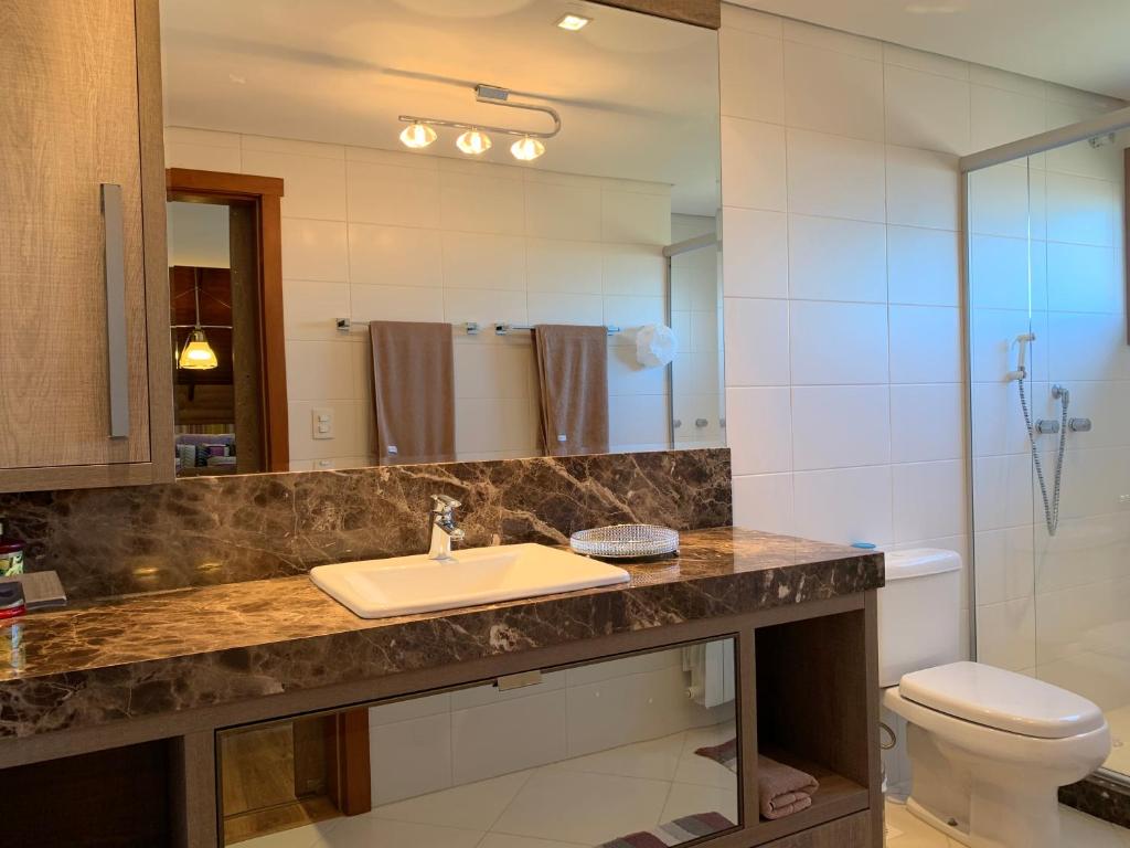 Vale das Hortênsias - Apto Gramado 300 metros Rua Coberta  Vale das Hortênsias - Apto Gramado 300 metros Rua Coberta