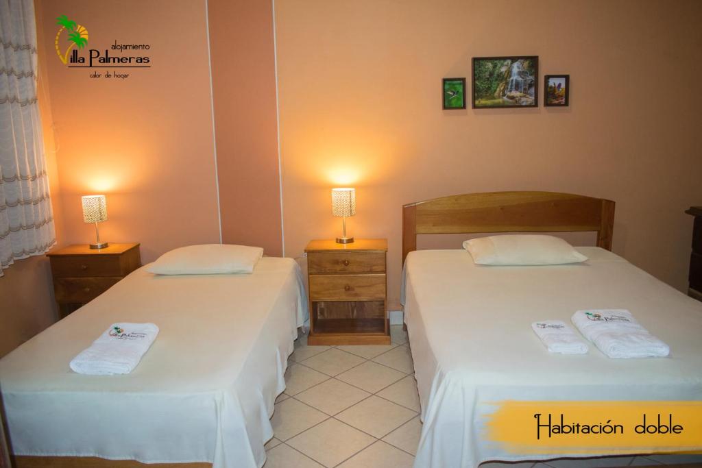 Postel nebo postele na pokoji v ubytování Alojamiento Familiar Villa Palmeras