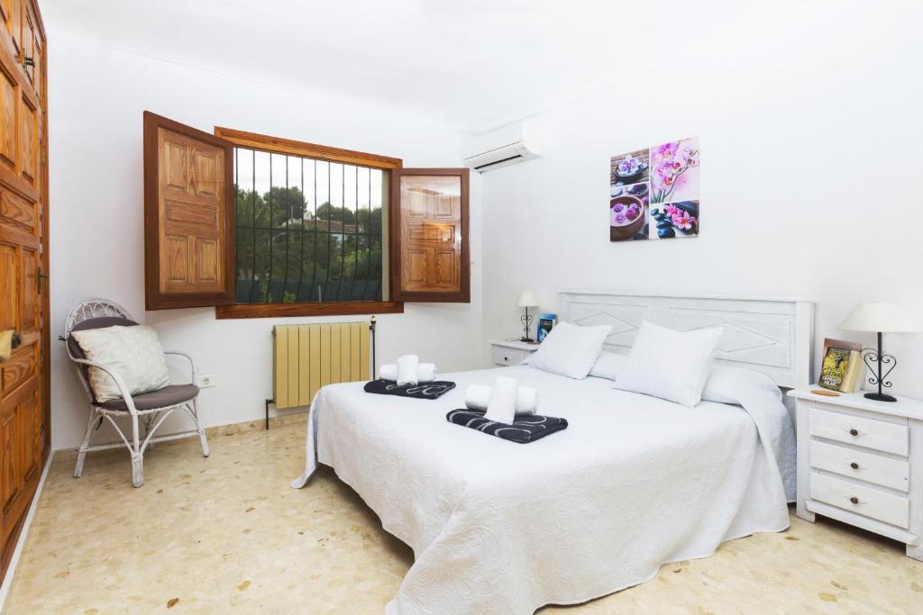 A bed or beds in a room at Jasmin