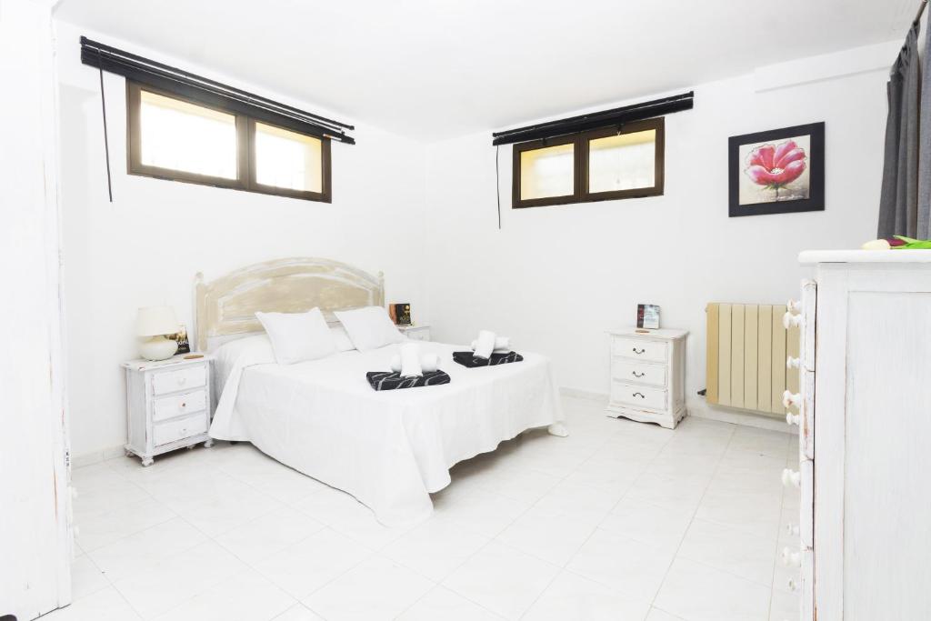 A bed or beds in a room at Jasmin