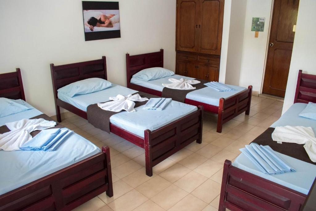 Postel nebo postele na pokoji v ubytování Hotel Joohn Gay only LGBTIQ
