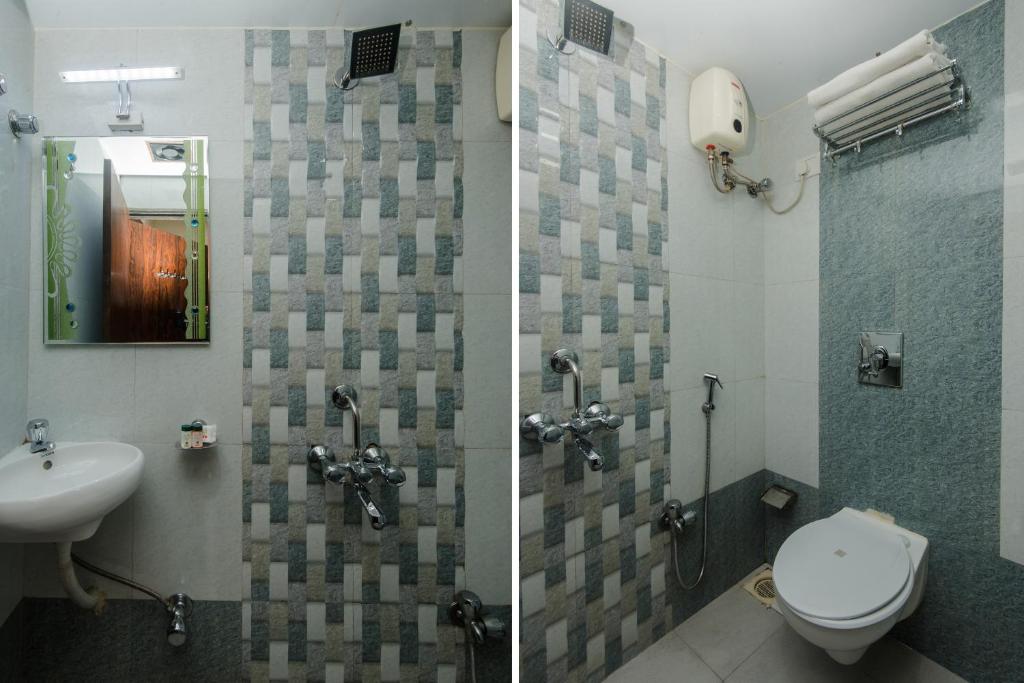 Koupelna v ubytování Hotel Amber-colaba