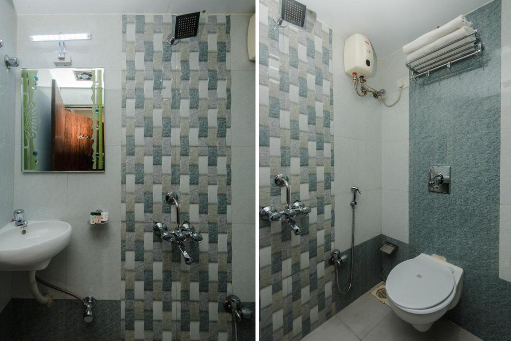Ett badrum på Hotel Amber-colaba