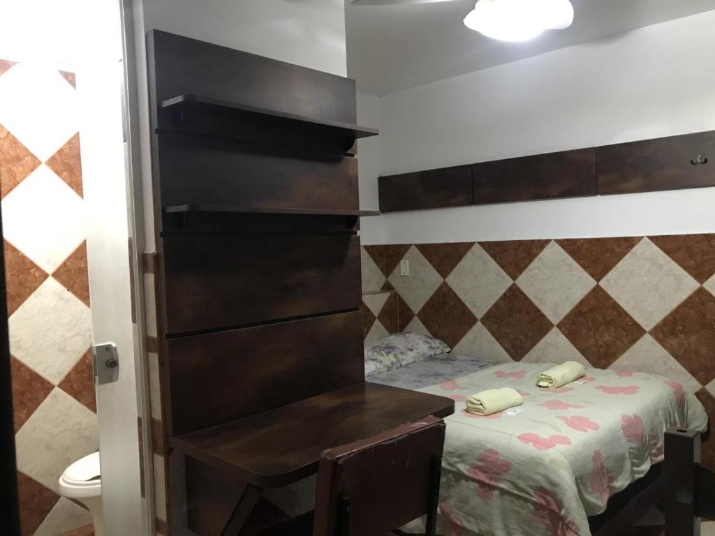 Postel nebo postele na pokoji v ubytování Piemont Hotel