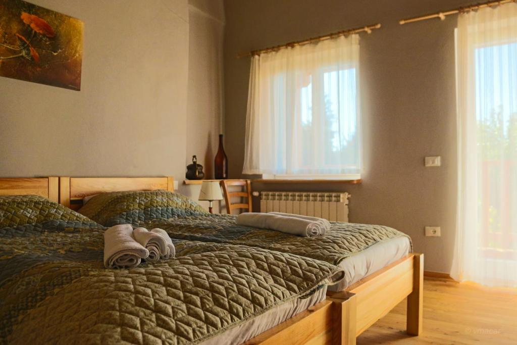 Posteľ alebo postele v izbe v ubytovaní Casa Lenka