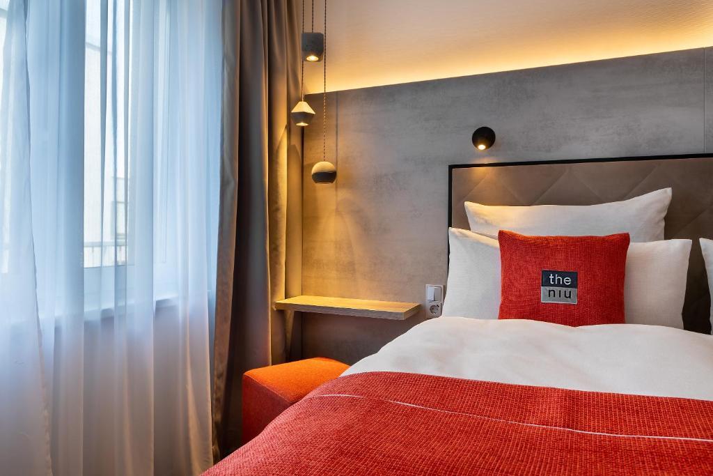 Postel nebo postele na pokoji v ubytování Holiday Inn - the niu, Hide Berlin Friedrichshain by IHG