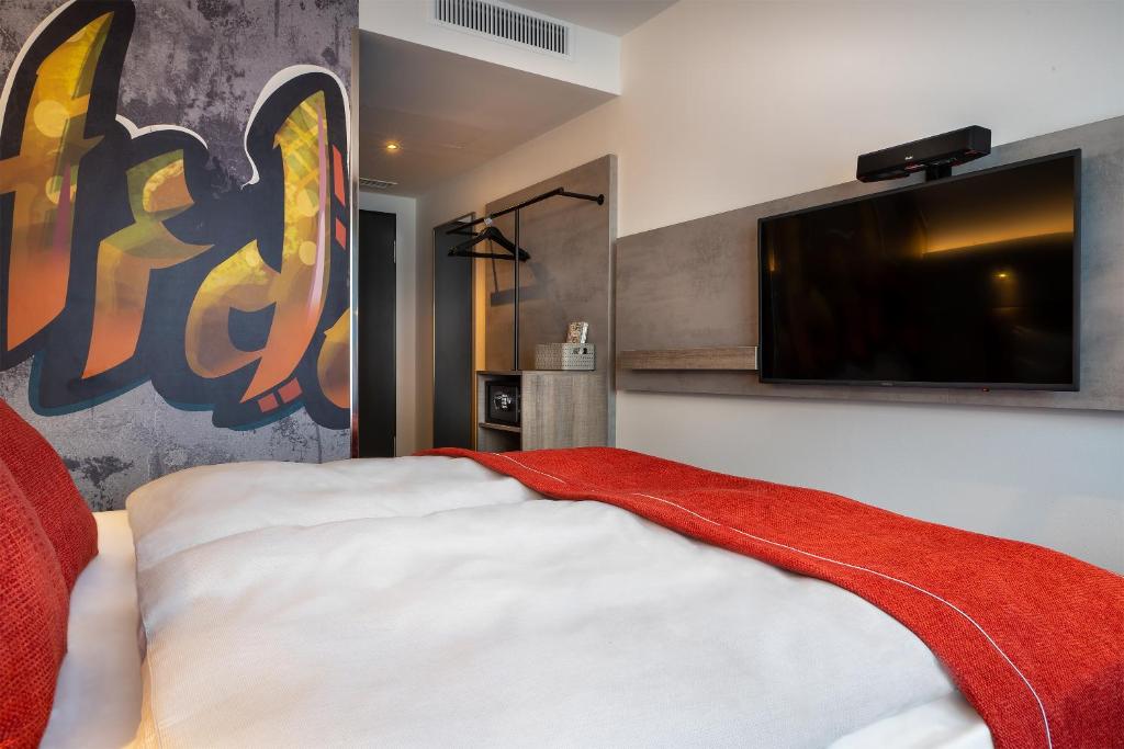 Postel nebo postele na pokoji v ubytování Holiday Inn - the niu, Hide Berlin Friedrichshain by IHG