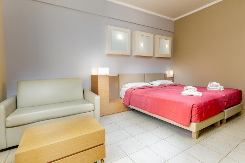 Postel nebo postele na pokoji v ubytování Sovereign Beach Hotel