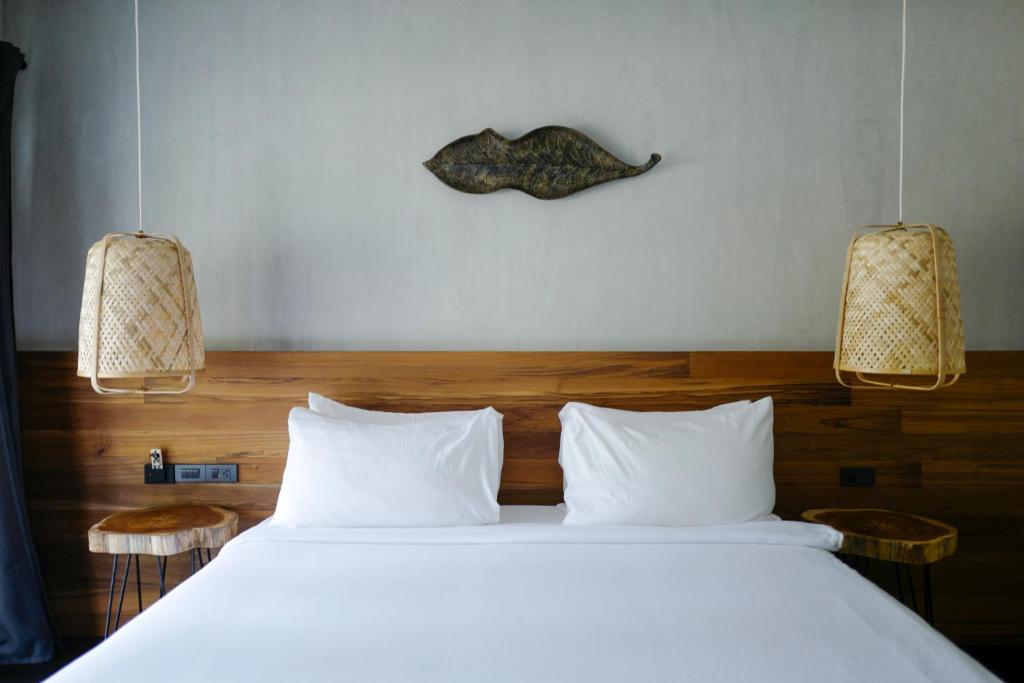 Кровать или кровати в номере Nature Beach Resort