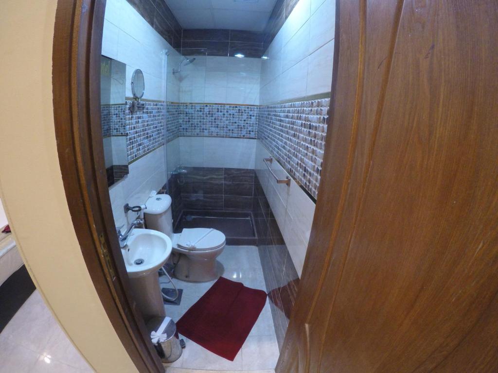 Koupelna v ubytování City Hotel