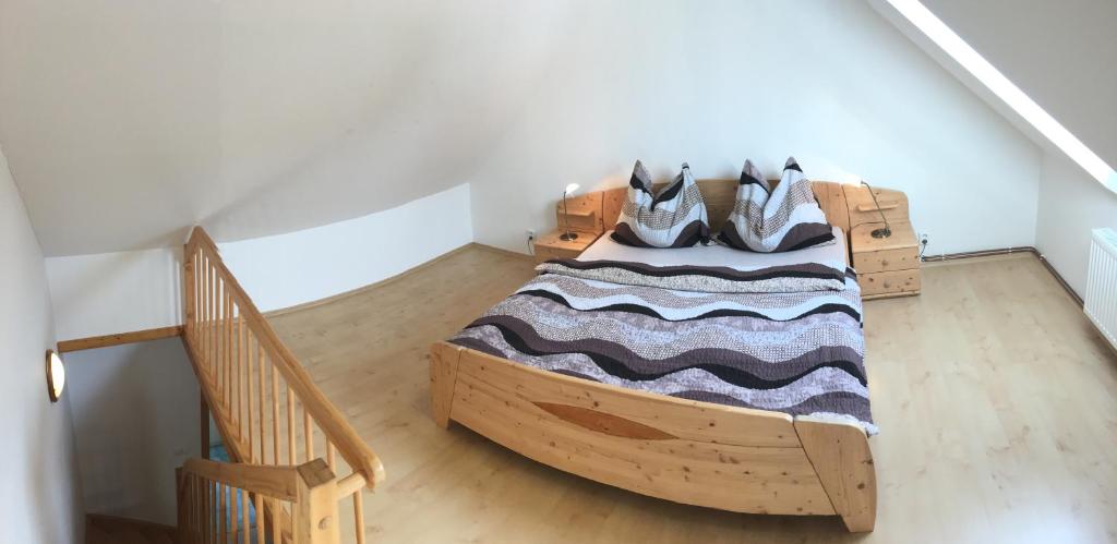 Postel nebo postele na pokoji v ubytování Apartmány Braníčkov