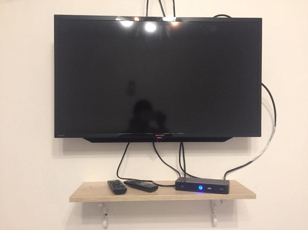 TV a/nebo společenská místnost v ubytování โฮมสเตย์ ยายหนั่น