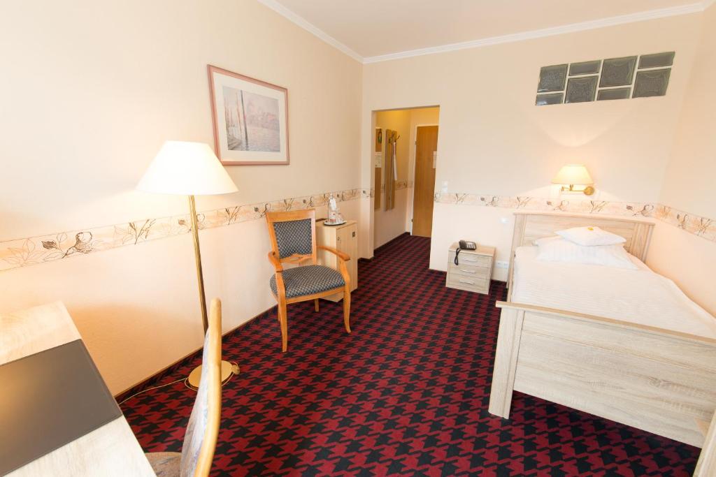 Postel nebo postele na pokoji v ubytování Hotel Krupp
