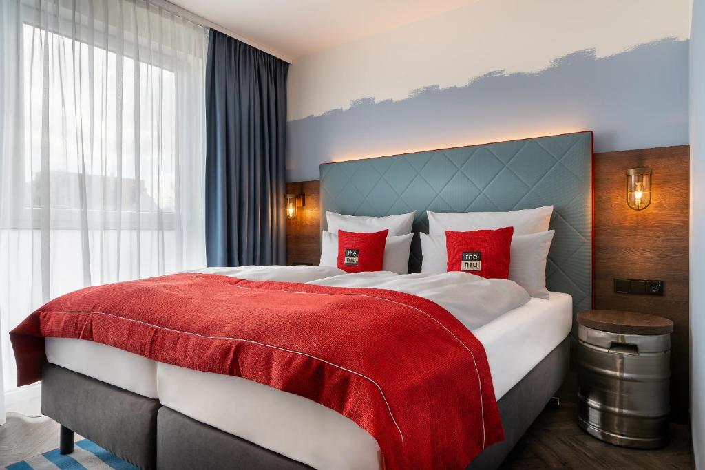 Postel nebo postele na pokoji v ubytování Holiday Inn - the niu, Keg Hamburg Ost by IHG