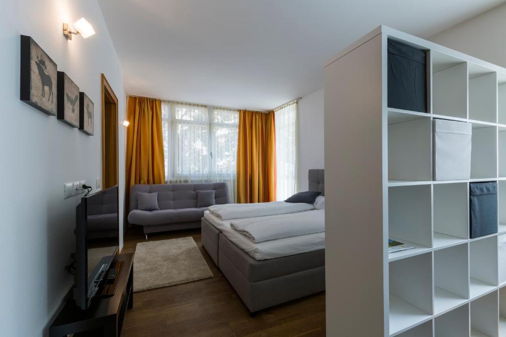 Posteľ alebo postele v izbe v ubytovaní Albergo Diffuso ELA Living - Design Apartment & Room