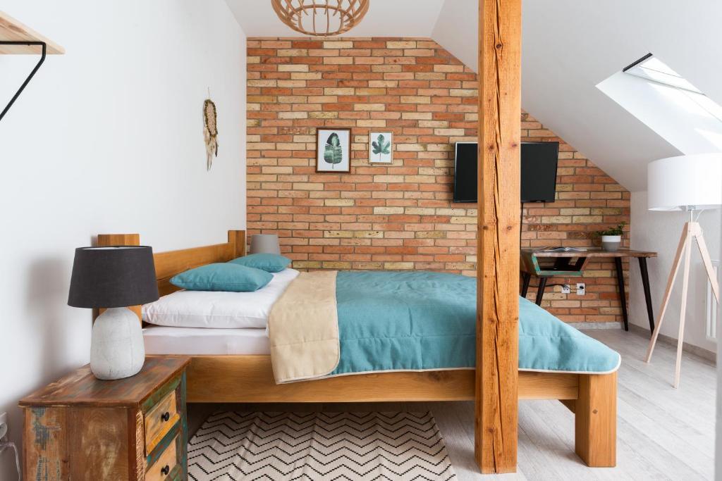 Postel nebo postele na pokoji v ubytování BURINA plant-based residence