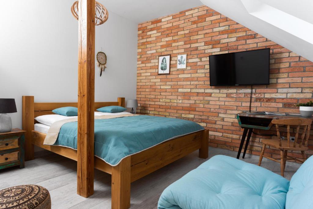 Postel nebo postele na pokoji v ubytování BURINA residence