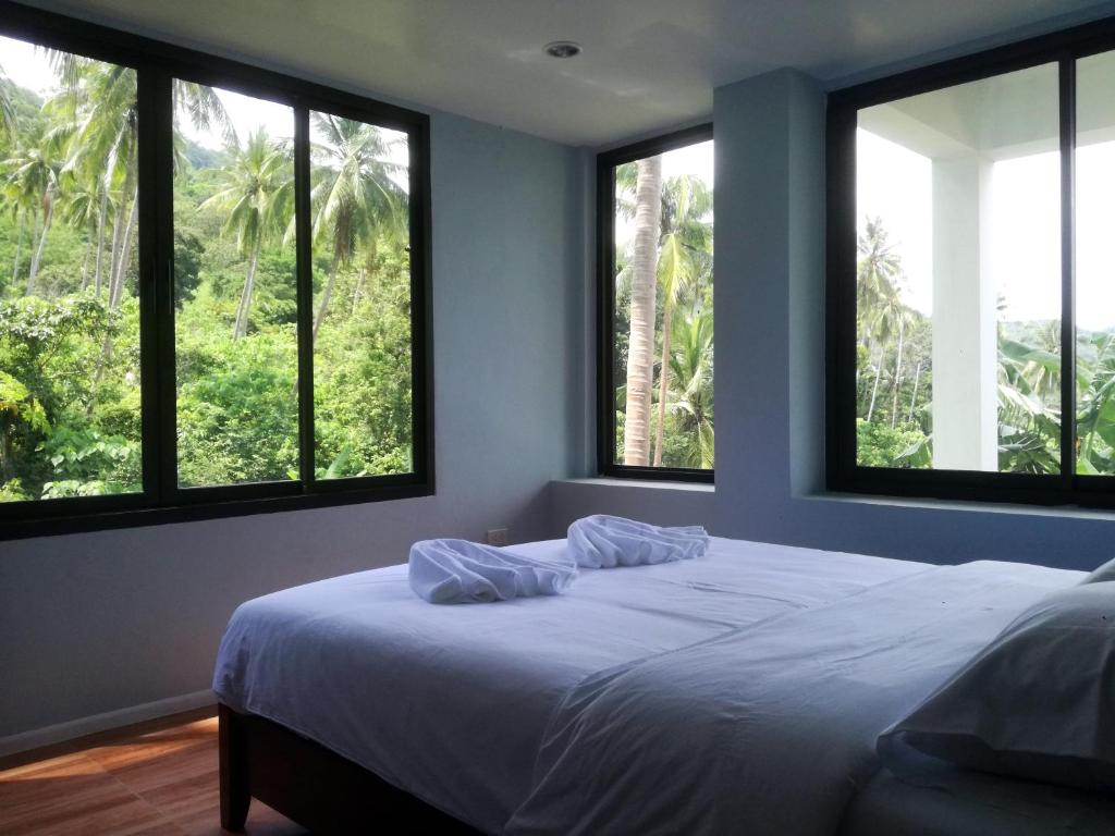Postel nebo postele na pokoji v ubytování Koh Samui Palm View Villa