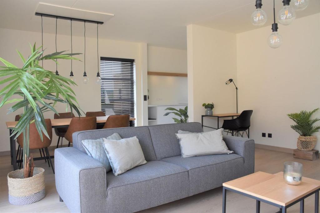 Posezení v ubytování Vakantiewoning Lescaut