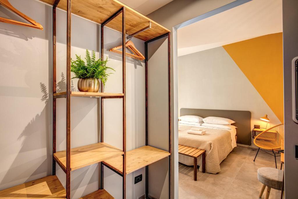 Postel nebo postele na pokoji v ubytování Hotel King