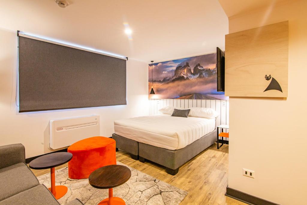 Postel nebo postele na pokoji v ubytování Hostal Boutique Black Cat