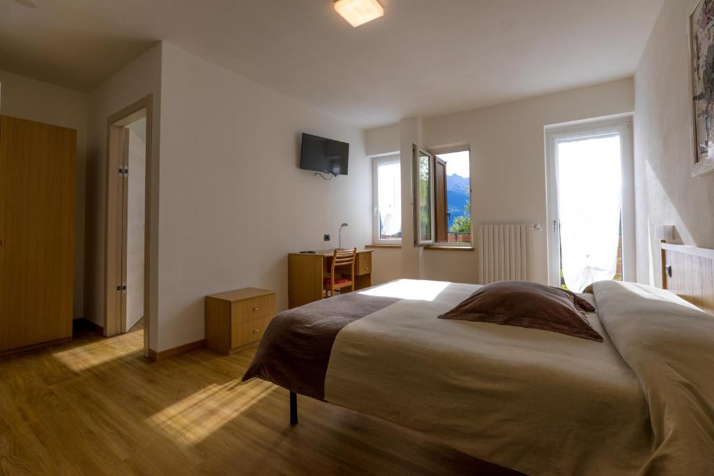 Postel nebo postele na pokoji v ubytování Hotel Ristorante Miravalle