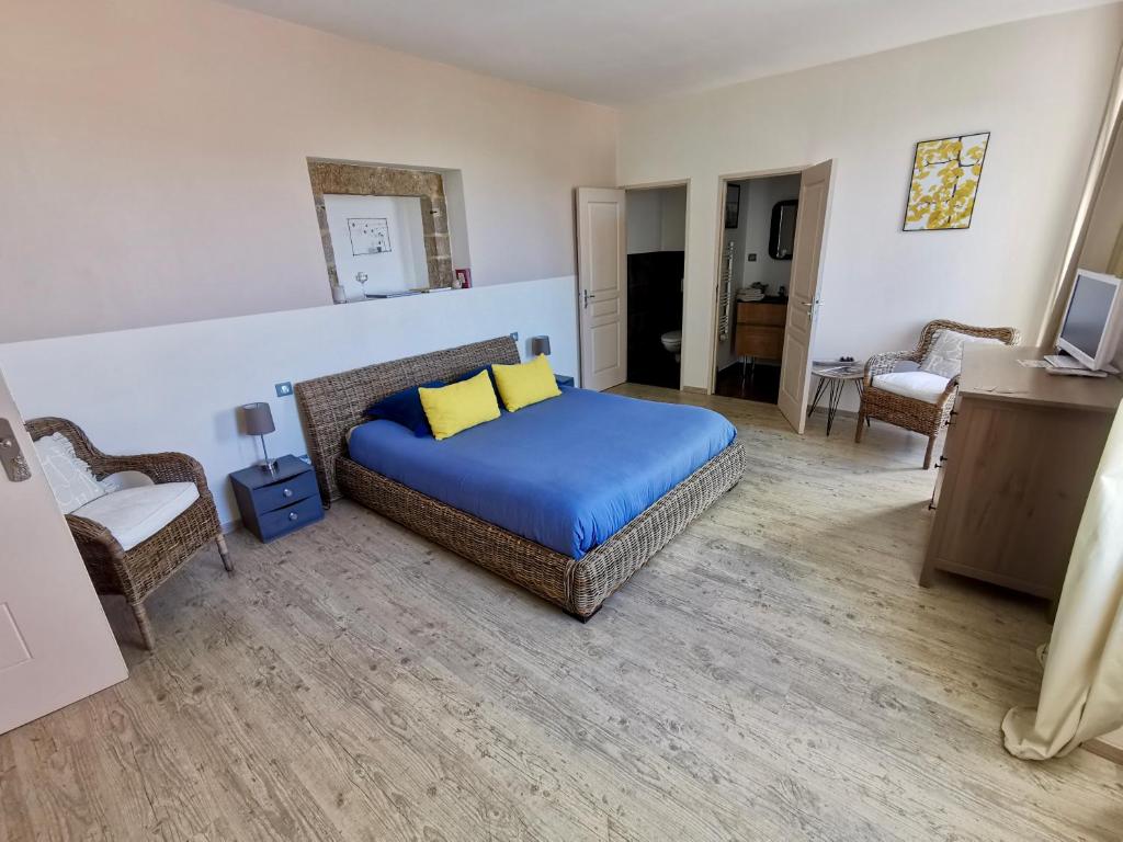 Postel nebo postele na pokoji v ubytování Le Mas des Loges - Les Vans / Chambonas