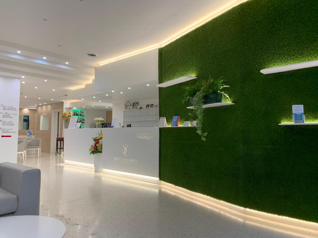 Hol lub recepcja w obiekcie Hotel San Carlo