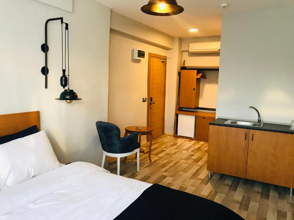 Postel nebo postele na pokoji v ubytování Barkod Otel