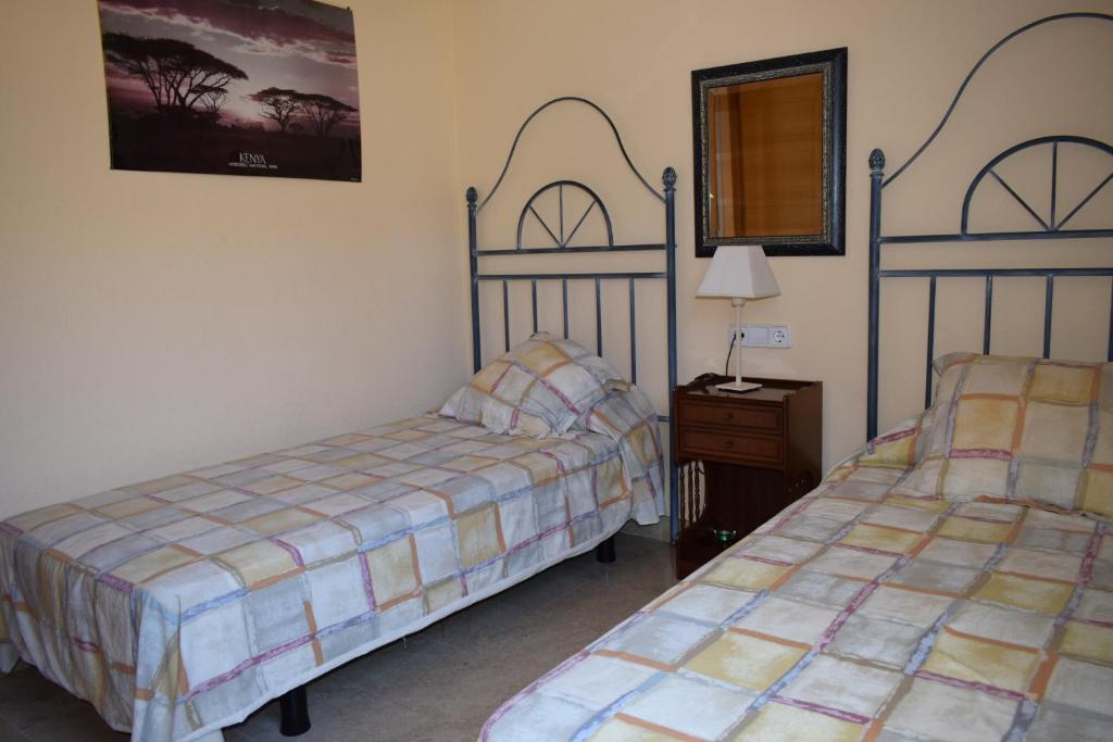 A bed or beds in a room at Anacasa Atlas Estrella de Mar AP2215