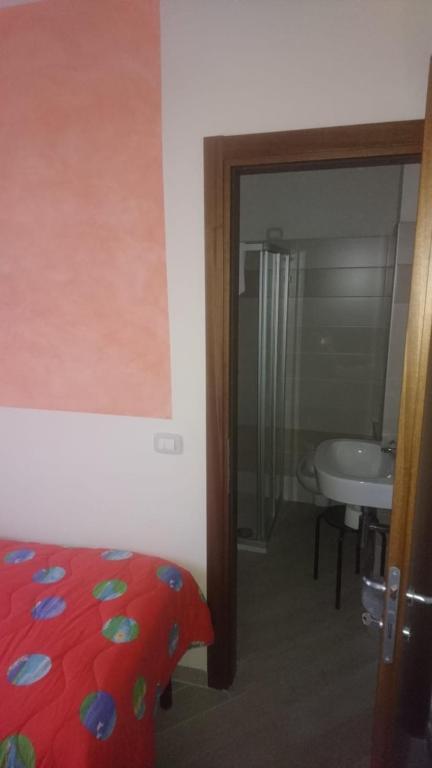 Postel nebo postele na pokoji v ubytování Hotel Lory