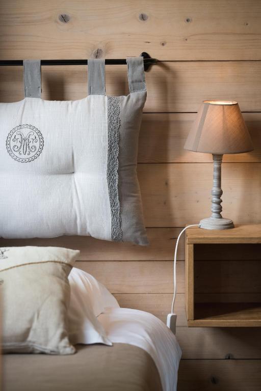 Postel nebo postele na pokoji v ubytování Hôtel La Montagne